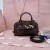 Miu Miu Aventure mini nappa leather bag-Briarwood