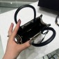 Borsa Prada Symbole mini in tessuto jacquard ricamato