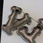LV Brooch
