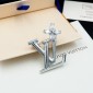LV Brooch