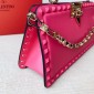 Valentino Garavani Rockstud handbag in calfskin.